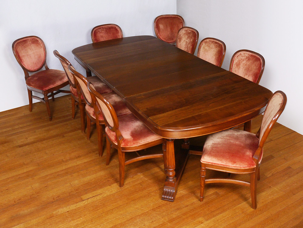 Appraisal: WALNUT DINING TABLE COMPLETE WITH LEAVES CHAIRS Expanding table with