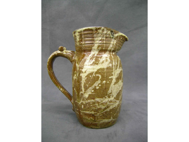 Appraisal: Karl Martz Brown County pottery pitcher high brown glaze with