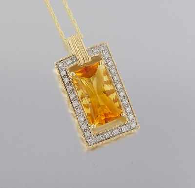 Appraisal: A Citrine and Diamond Pendant k yellow gold pendant set