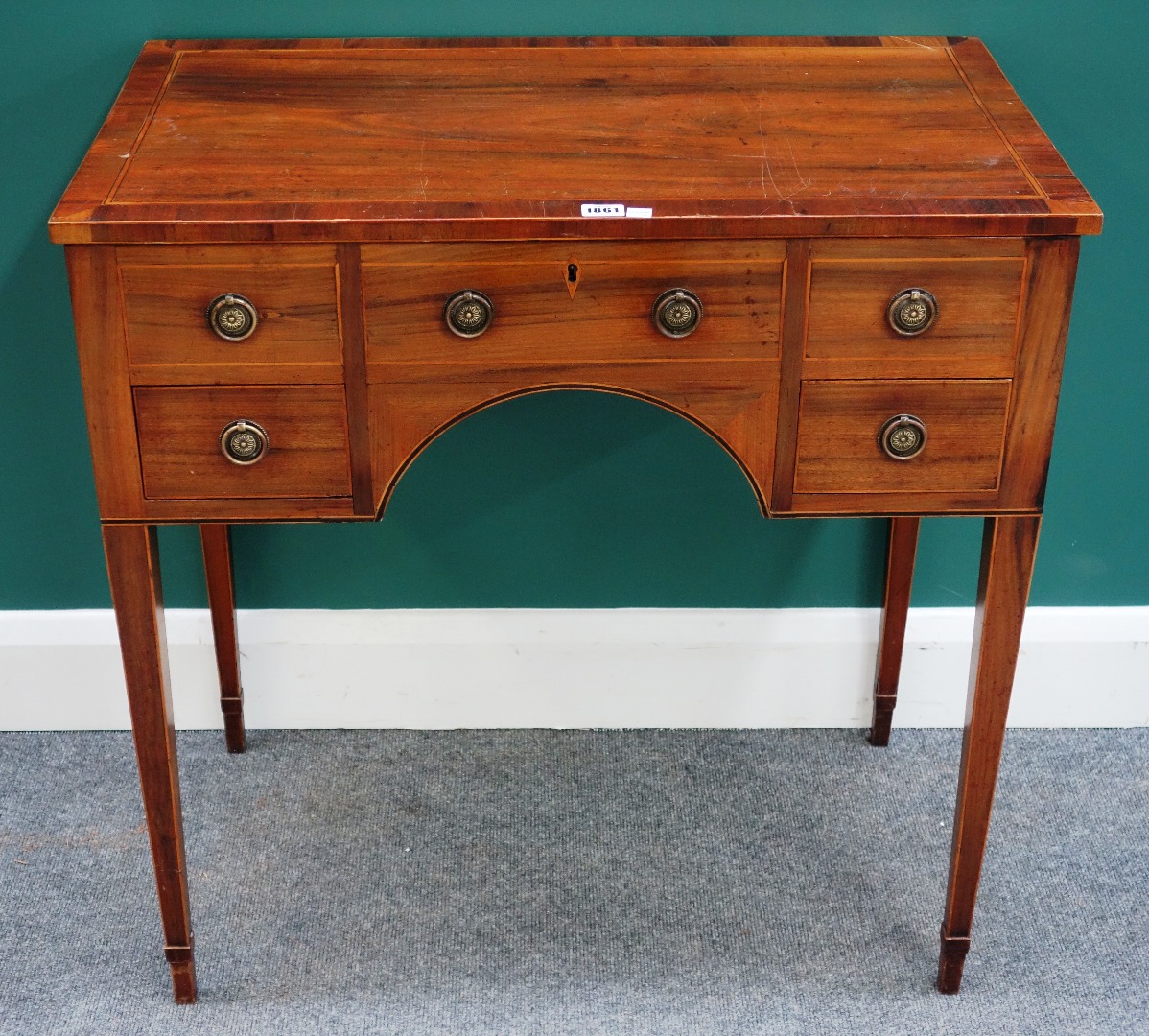 Appraisal: A George III crossbanded kingwood lift top dressing table on