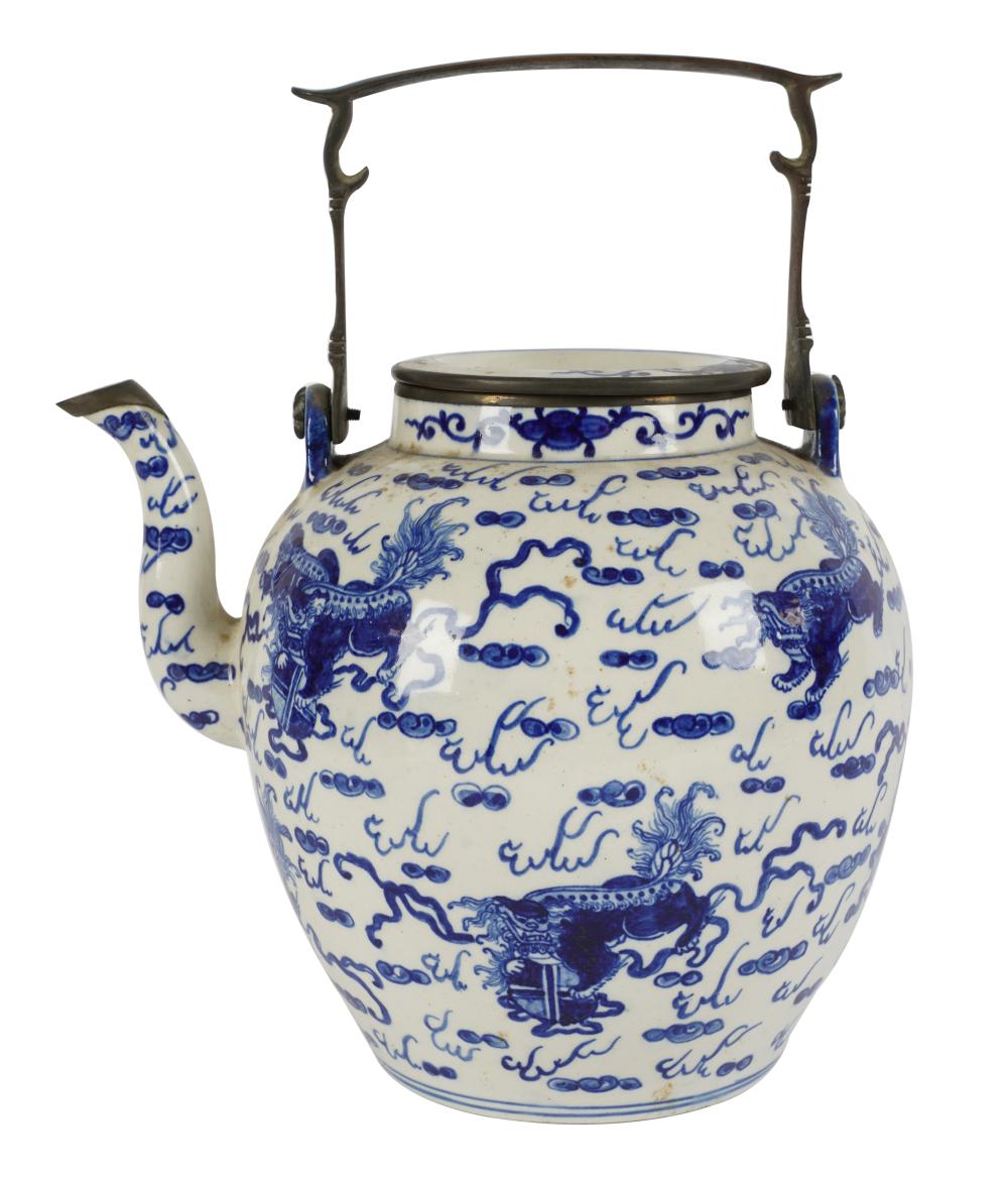 Appraisal: CHINESE BLUE WHITE TEAPOTunmarked with metal handle Provenance Property from