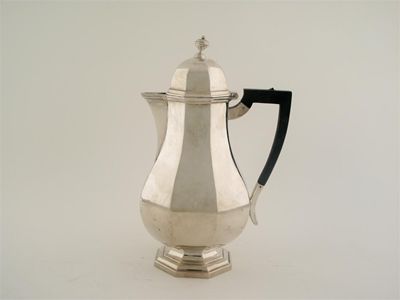 Appraisal: A modern octagonal hot water jug of baluster form with