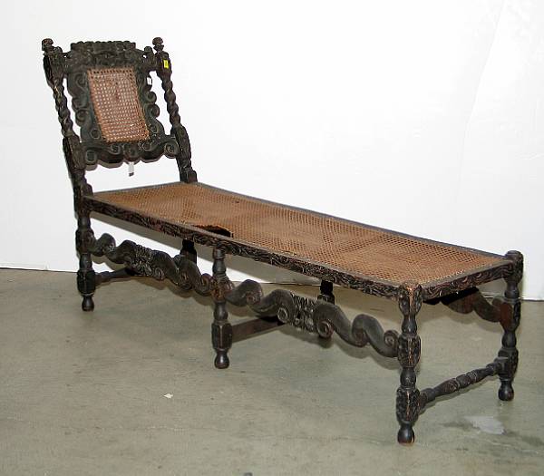 Appraisal: A William and Mary style caned and painted day bed