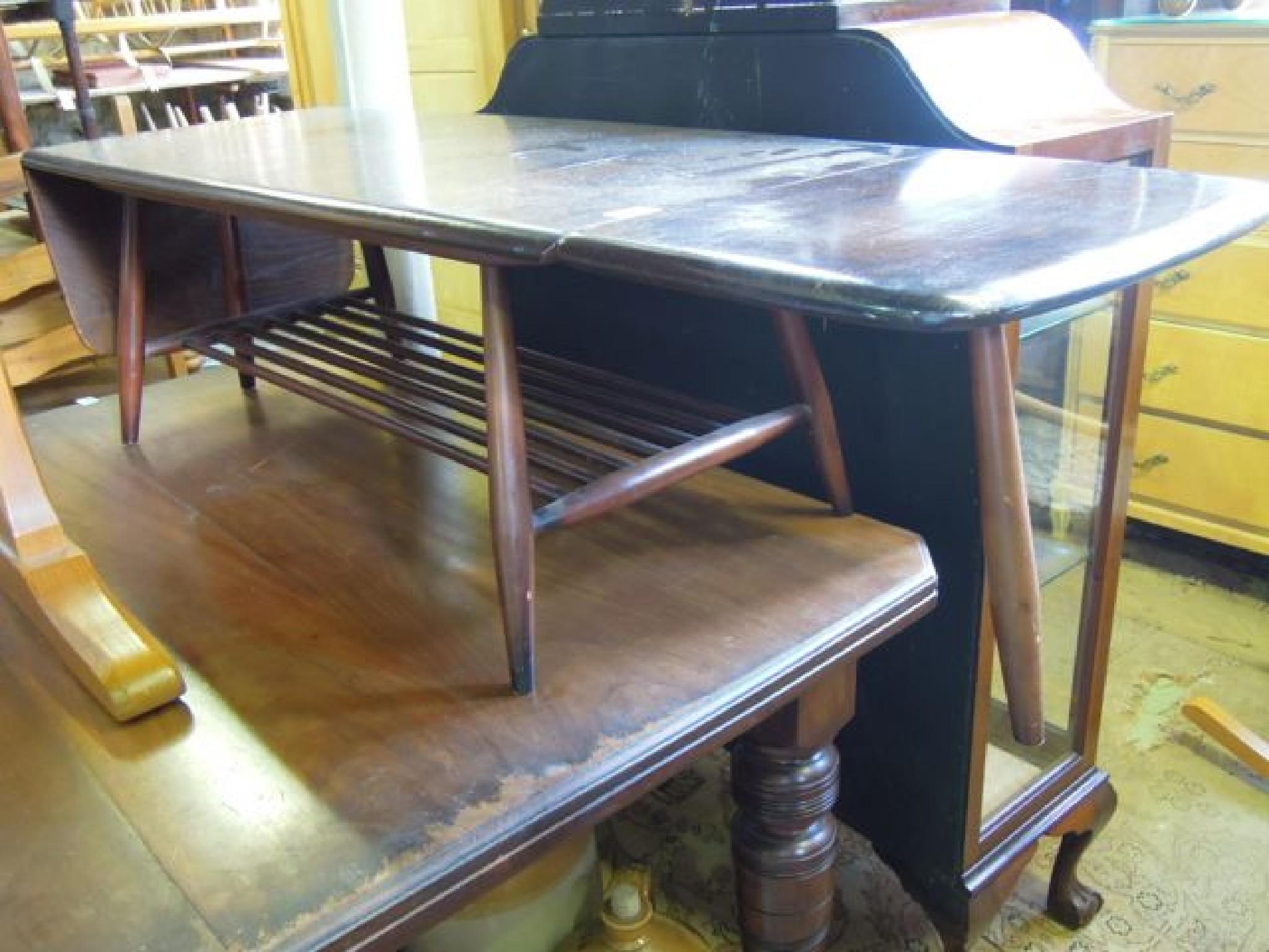 Appraisal: An Ercol dark stained elm and beechwood occasional table of