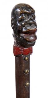 Appraisal: Riverboat Folk-Art Cane Ca A carved and painted one-piece cane