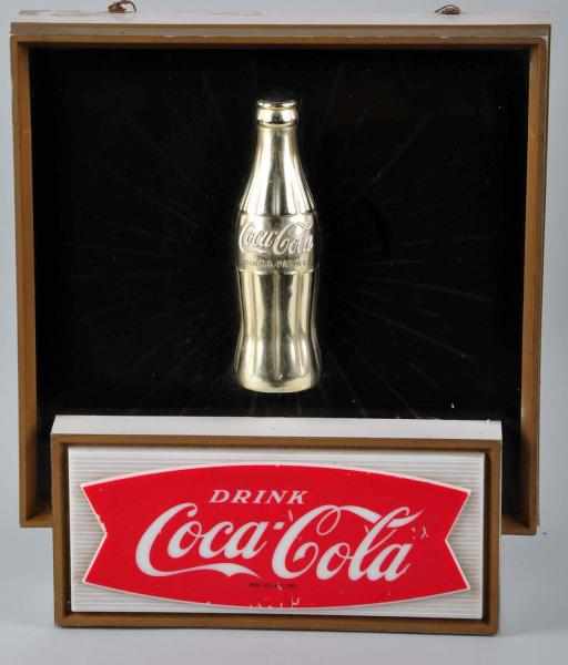 Appraisal: s Coca-Cola Starburst Light-Up Sign Description Features a bottle Displays