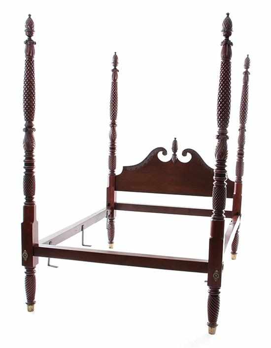 Appraisal: American Classical carved mahogany four poster bed circa pineapple finials