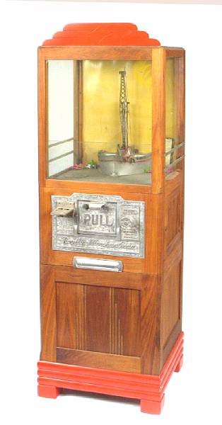 Appraisal: A Novelty Merchantman claw arcade game by Exhibit Supply Co