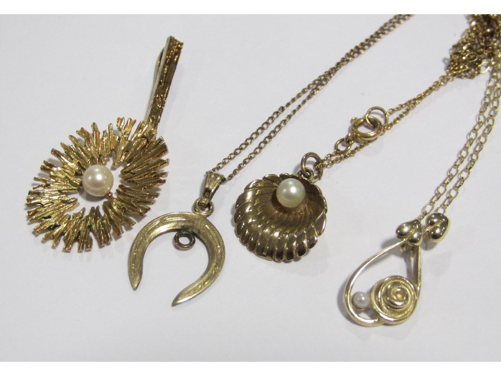 Appraisal: Lot comprising three ct gold pearl set pendants a rolled