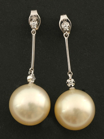 Appraisal: A pair of South Sea pearl and diamond earrings The