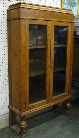 Appraisal: Vintage Oak Double-door Bookcase solid oak with glass doors on