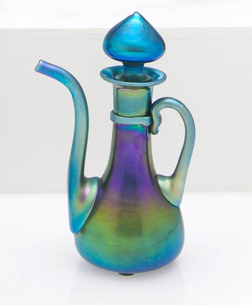 Appraisal: A Steuben blue Aurene glass gooseneck cruet shape circa engraved