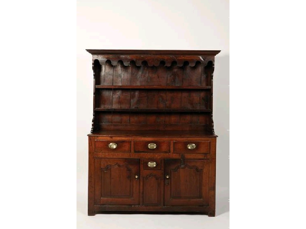 Appraisal: A GEORGE III OAK DRESSER the raised back with two