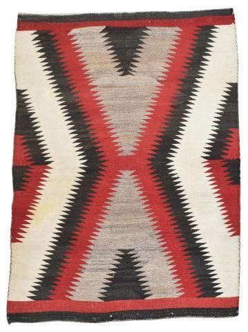 Appraisal: Native American Navajo hand-woven rug in red black and grey