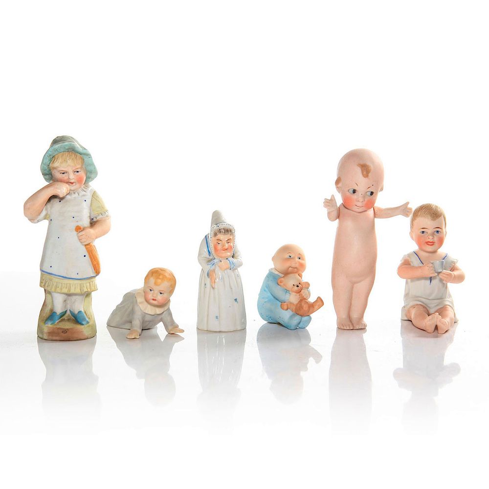 Appraisal: BISQUE FIGURINES OF CHILDREN AND CANDLE SNUFFER Vintage porcelaine Issued