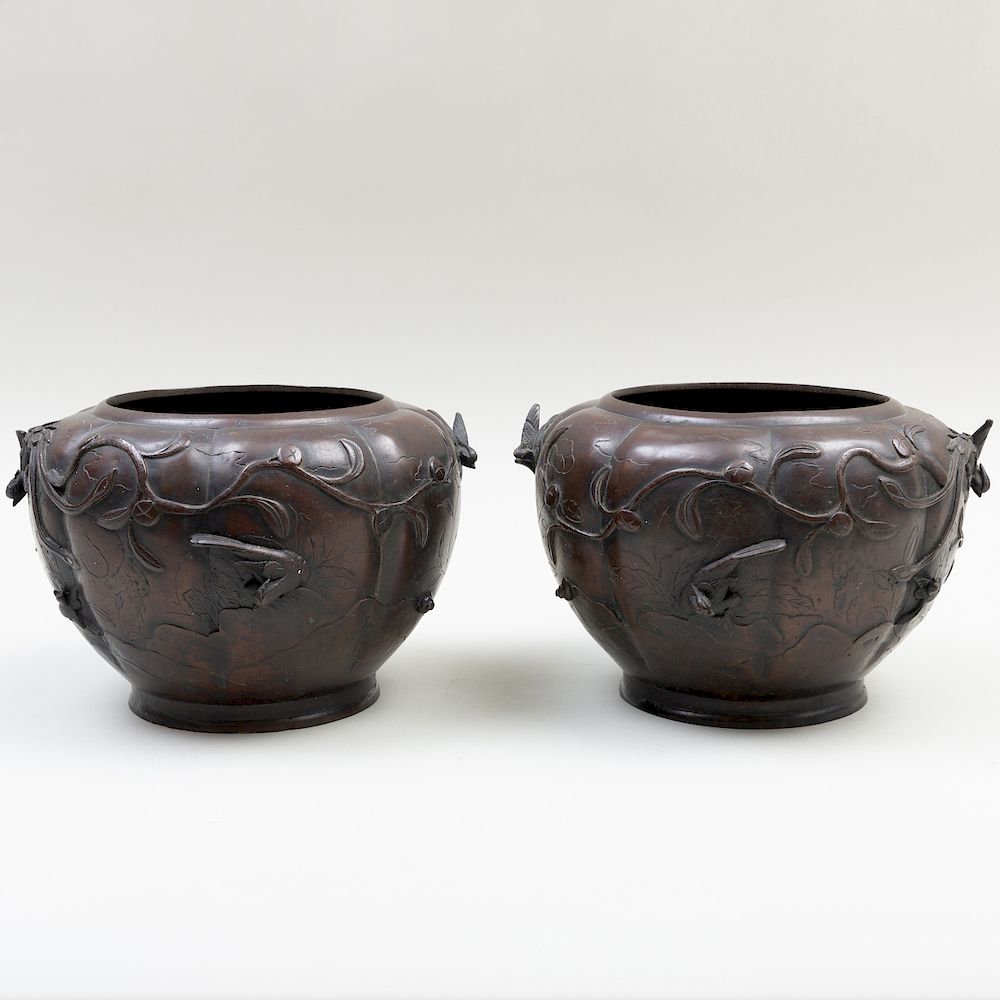 Appraisal: Pair of Japanese Tokyo Bronze Vessels Each decorated with phoenix