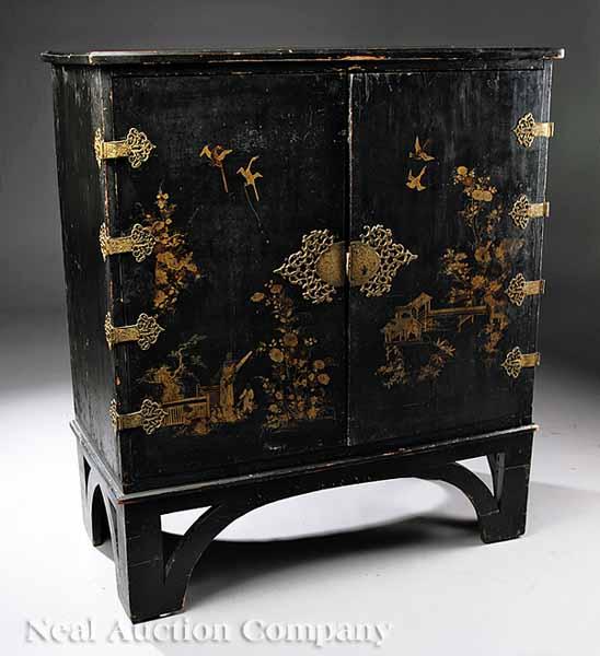 Appraisal: An English Chinoiserie Lacquer Cabinet on Stand th c doors