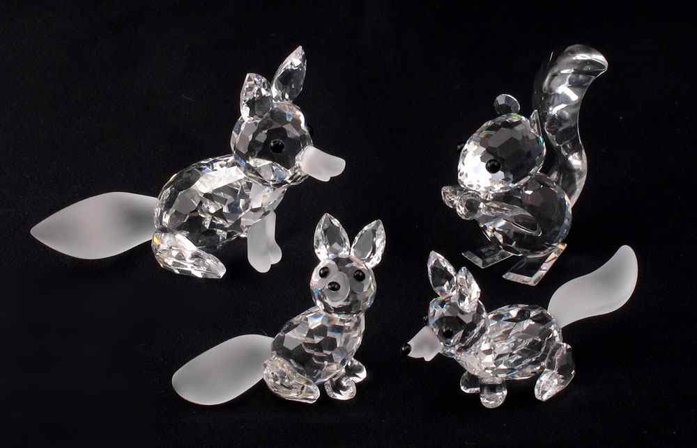 Appraisal: SWAROVSKI CRYSTAL FIGURINES To include LARGE FOX frosted nose Adi