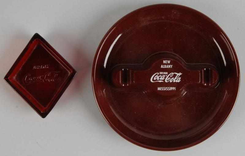 Appraisal: Lot of Coca-Cola Ashtrays Description s Includes one ruby glass