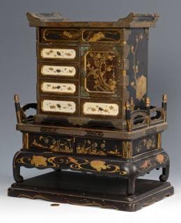 Appraisal: Japanese Takamaki Japanese gilt lacquered miniature collector's or tea cabinet