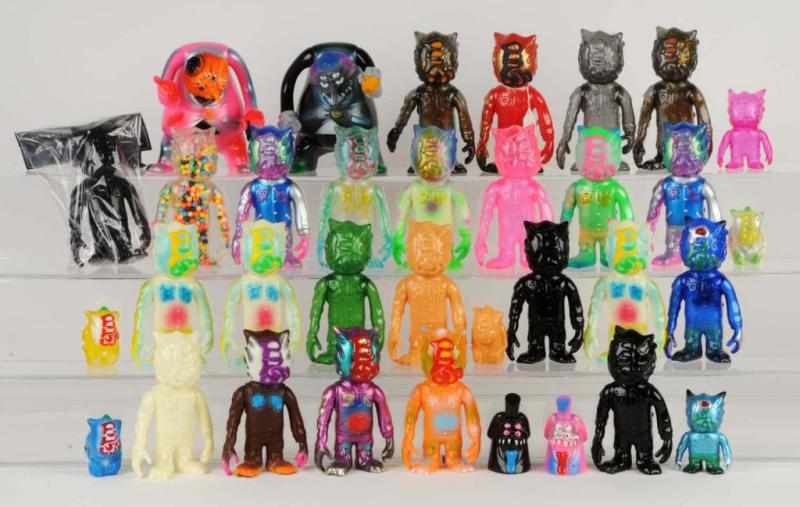 Appraisal: Lot of Real Head Pop Soda Soft Vinyl Figures Description