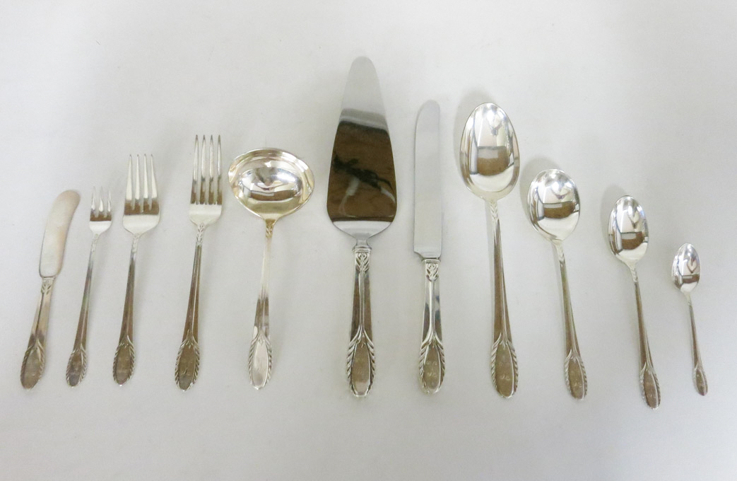 Appraisal: INTERNATIONAL TROUSSEAU STERLING SILVER FLATWARE SET plus storage chest one