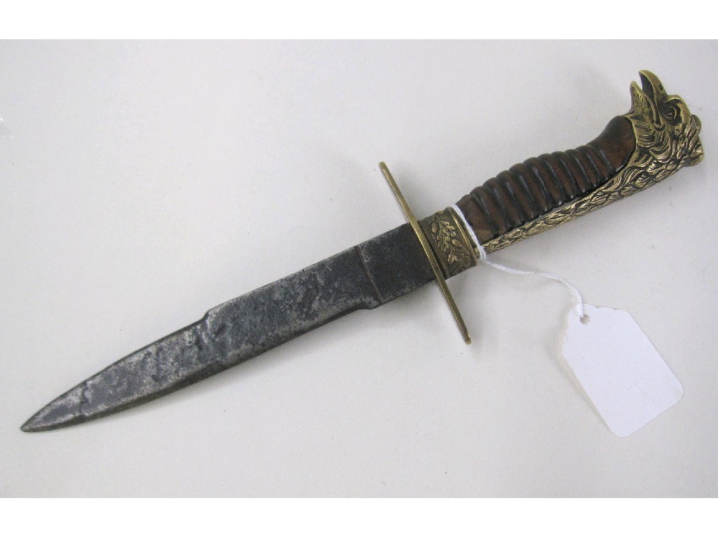 Appraisal: Dagger with wooden hilt mounted with brass modelled as an