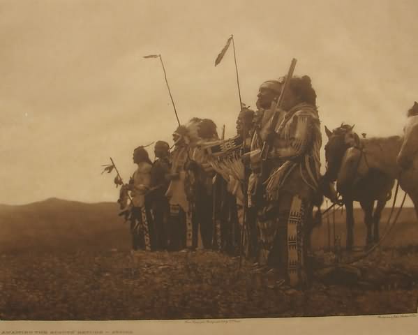 Appraisal: Photogravure by Edward S Curtis titled Awaiting The Scouts' Return-Atsina