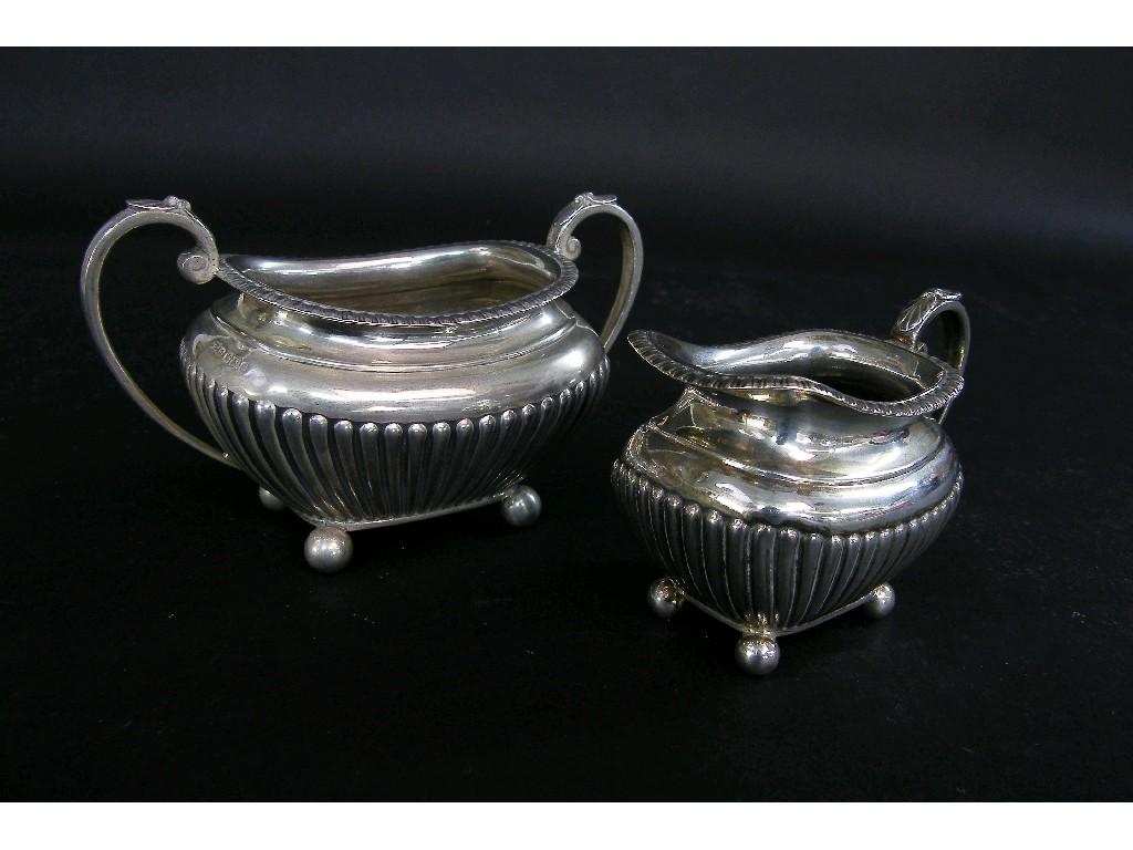 Appraisal: Late Victorian twin handled sucrier and milk jug each with