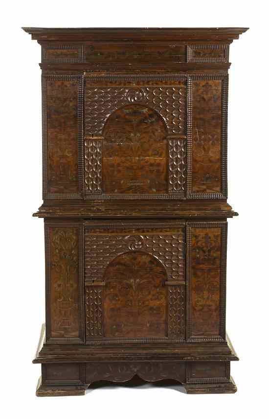 Appraisal: A Northern European Carved and Painted Cabinet in two parts