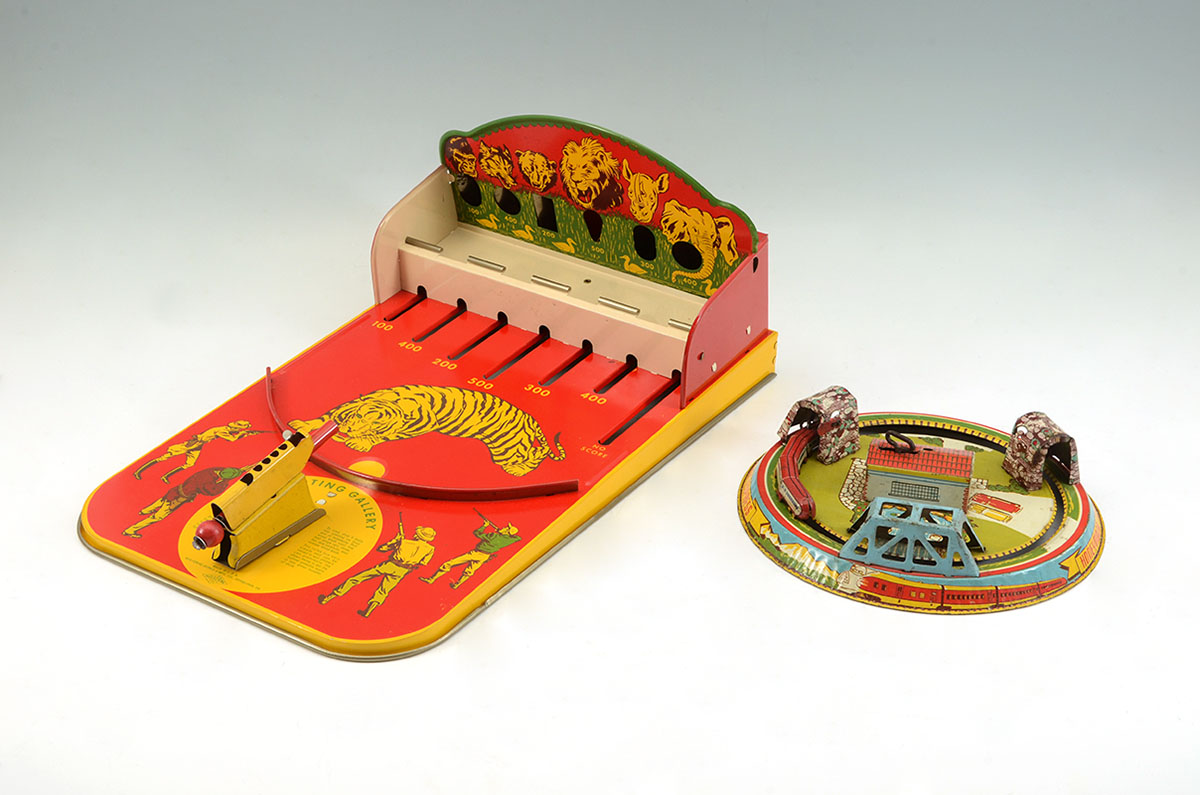 Appraisal: MARX HONEYMOON EXPRESS WOLVERINE SHOOTING GAME TOYS pieces tin litho