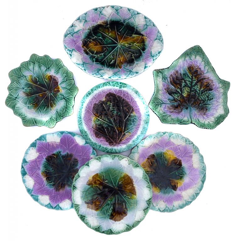 Appraisal: SEVEN SIMILAR MAJOLICA LEAF MOULDED PLATES AND DISHES the centre