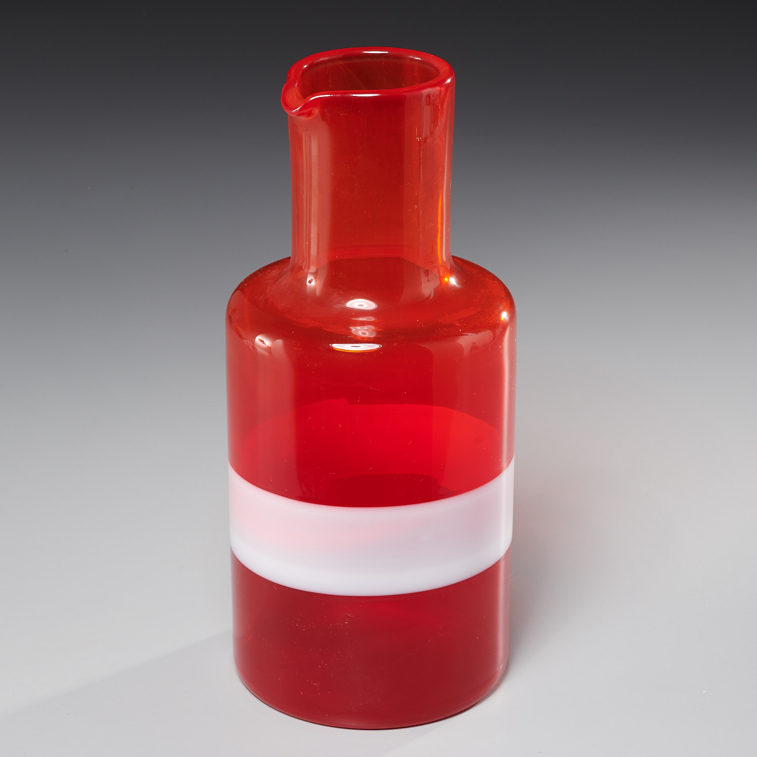 Appraisal: FULVIO BIANCONI FOR VENINI FASCE PITCHER c handblown red glass