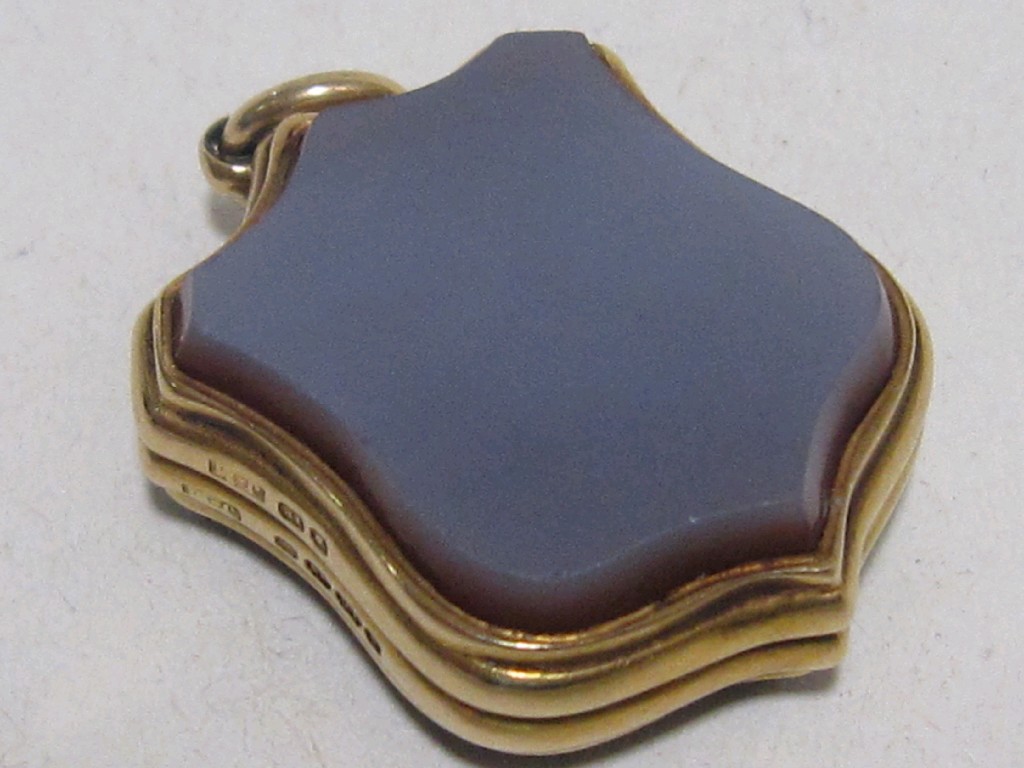 Appraisal: Victorian ct gold mounted agate shield shaped locket fob