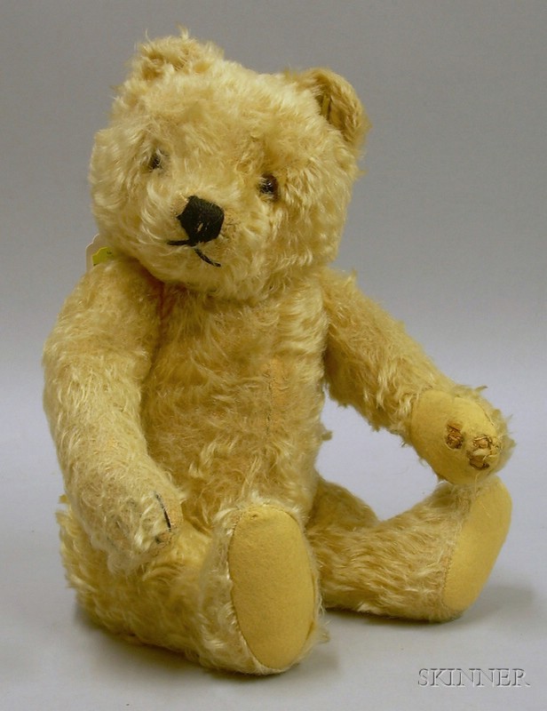 Appraisal: Steiff Gold Shaggy Mohair Teddy Bear with ear button and