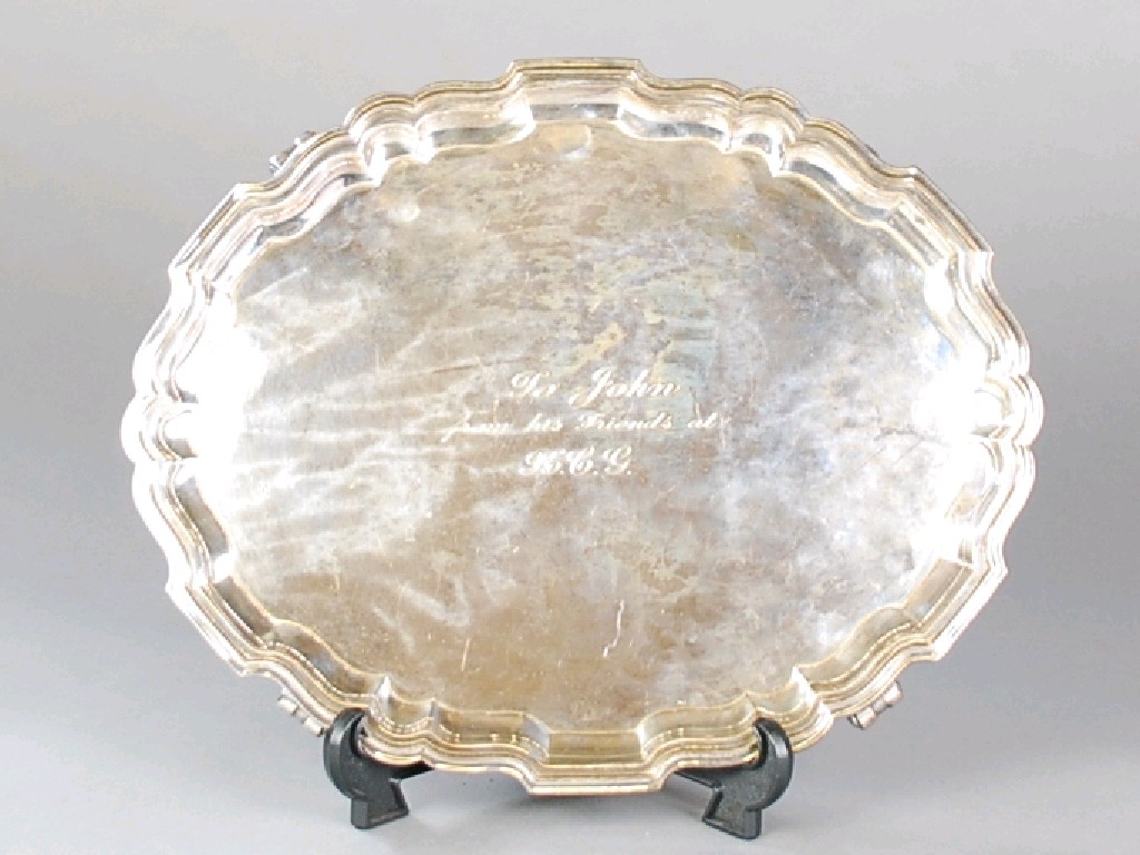 Appraisal: SILVER OVAL TRAY WITH CHIPPENDALE STYLE SHAPED AND STEP MOULDED