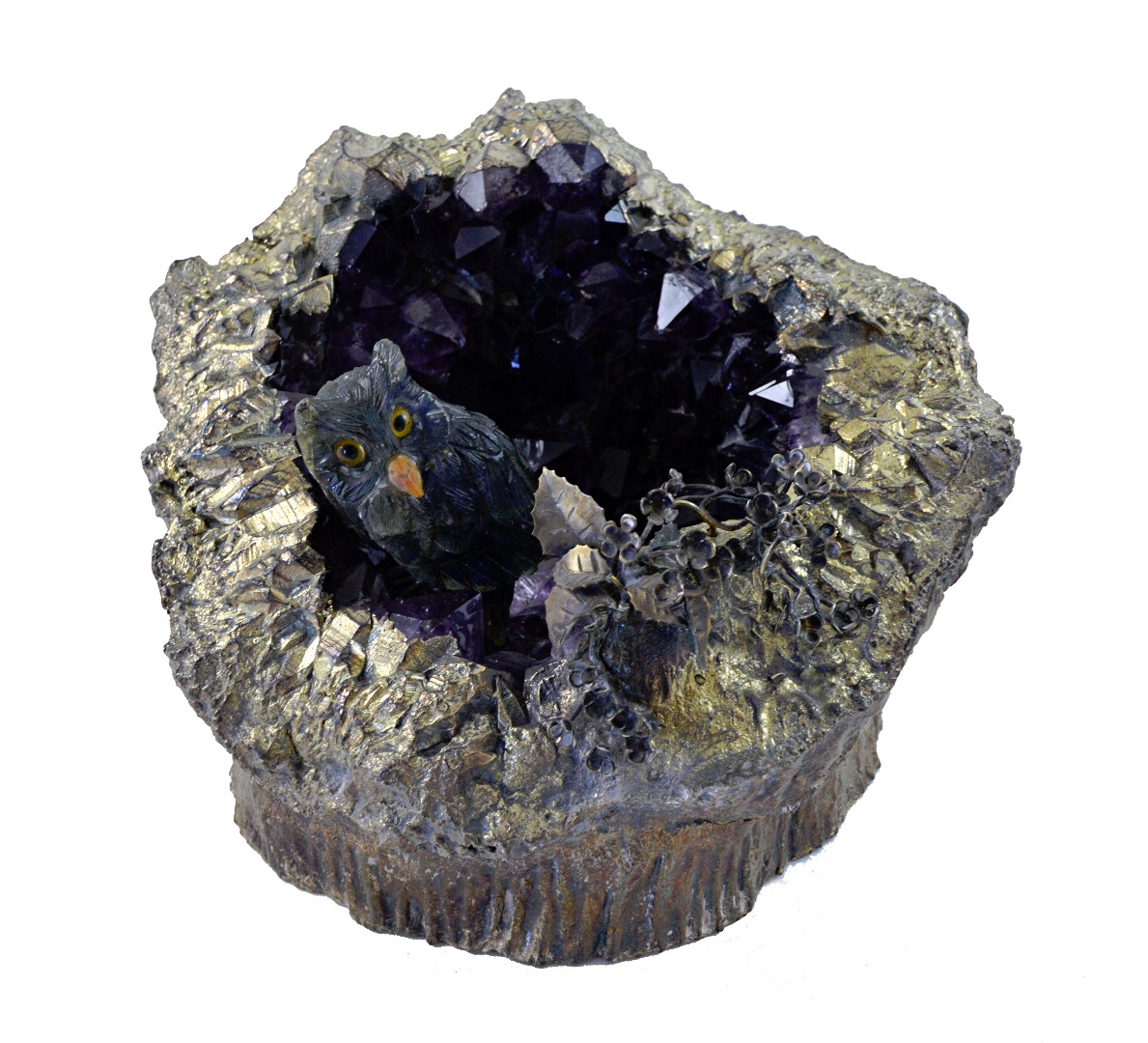 Appraisal: A contemporary amethyst geode and labradorite sculpture the carved figure