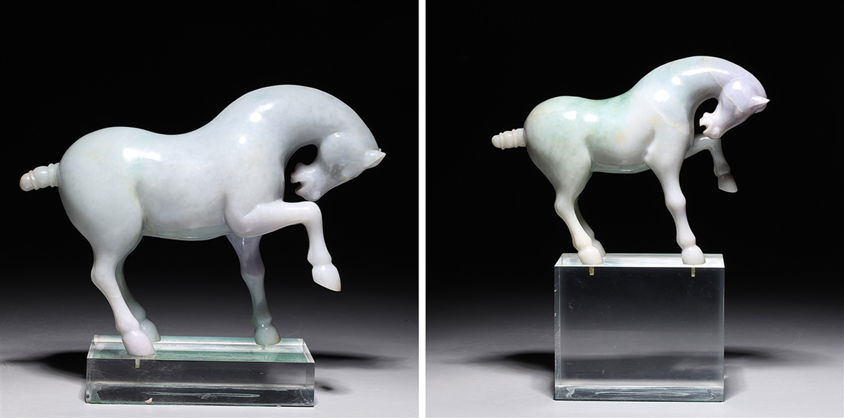 Appraisal: Pair of Antique Chinese carved jadeite horses each with custom