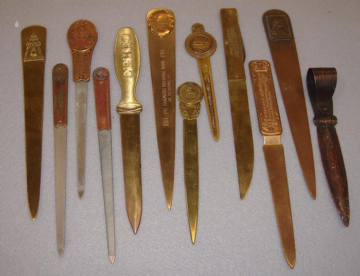 Appraisal: Lot of vintage brass and white metal advertising letter openers