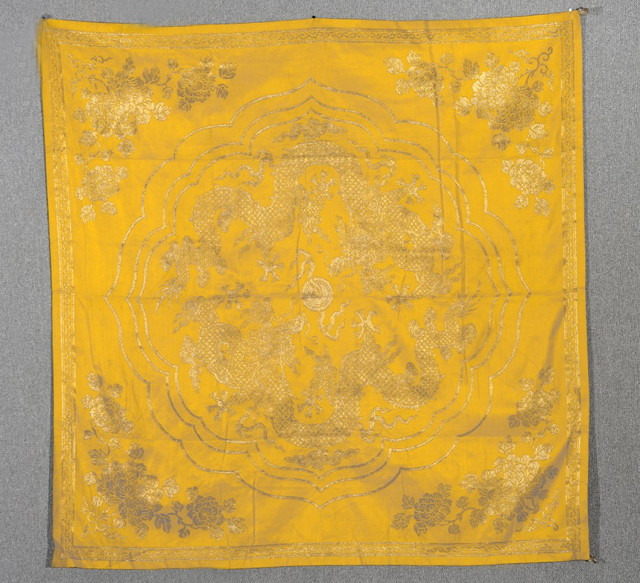 Appraisal: A CHINESE YELLOW SILK AND GOLD THREAD SQUARE PANEL depicting