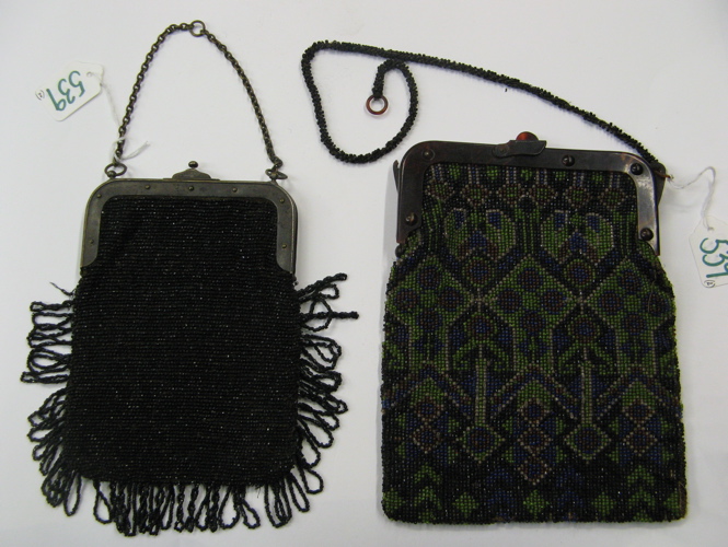 Appraisal: TWO LADY'S BEADED PURSES One is a multi-color geometric design