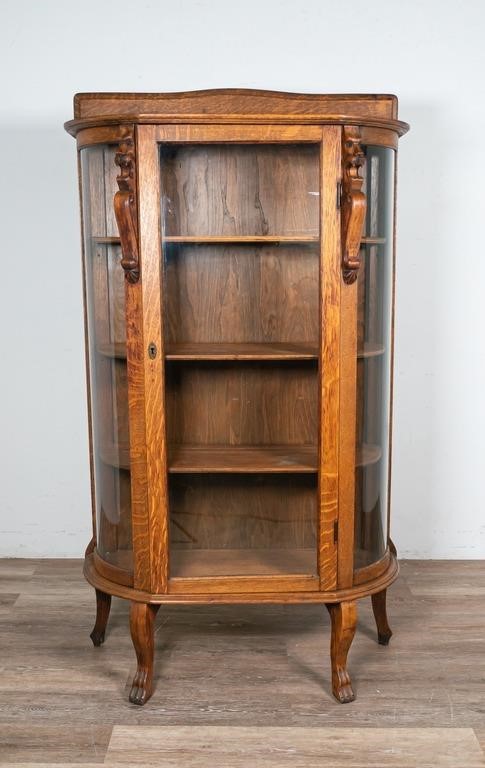 Appraisal: VICTORIAN BOWFRONT CURIO CABINETVictorian bowfront curio cabinet Early th century