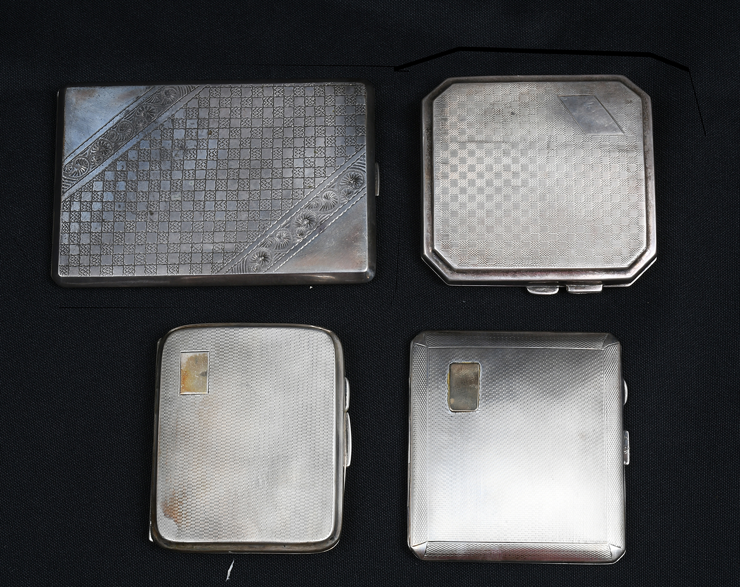 Appraisal: ART DECO SILVER CIGARETTE CASES Comprising - Curved English case