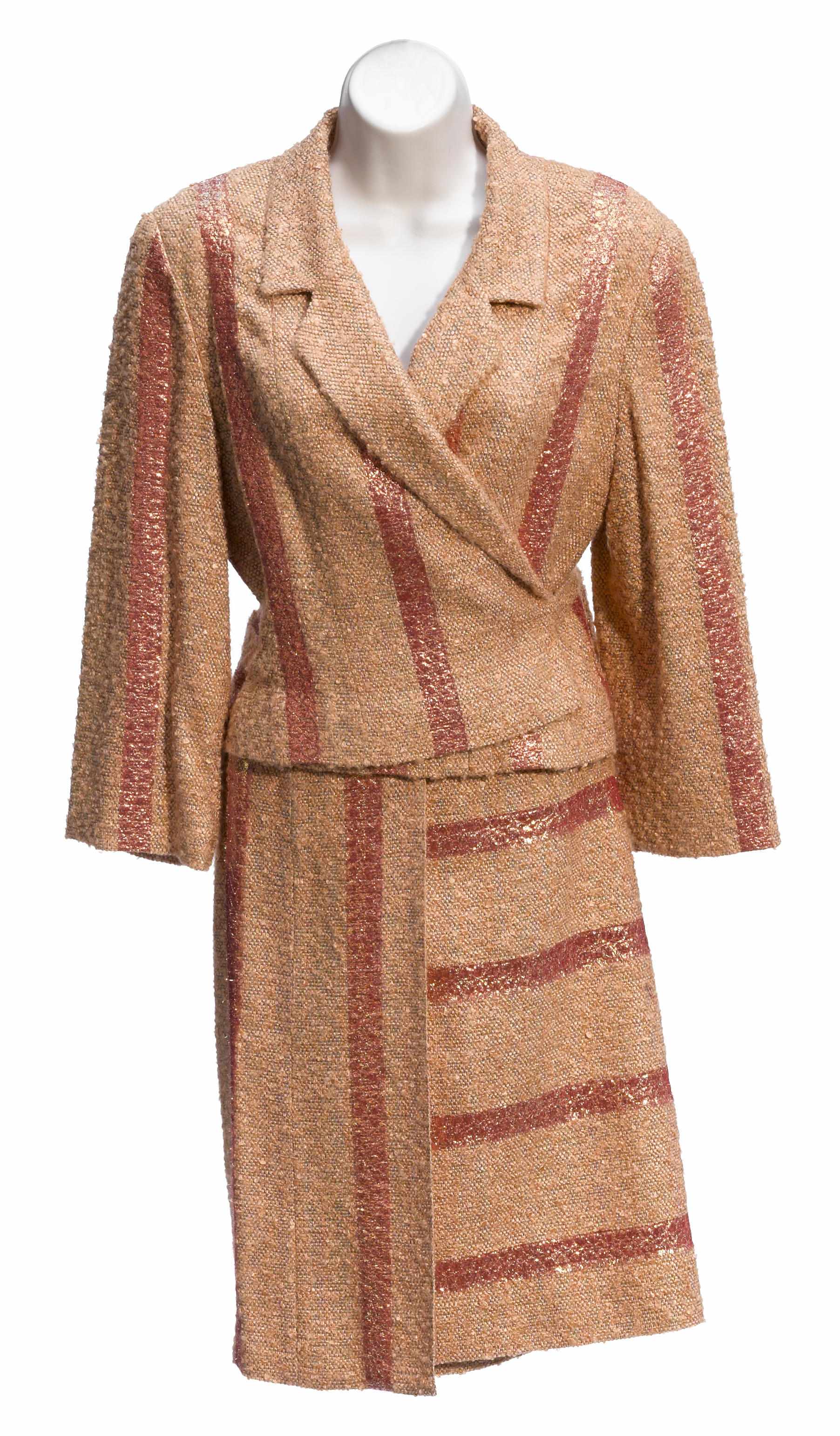 Appraisal: A Chanel orange and pink boucl jacket and skirt suit