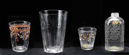 Appraisal: Three etched and enameled glass tumblers and etched bottle th