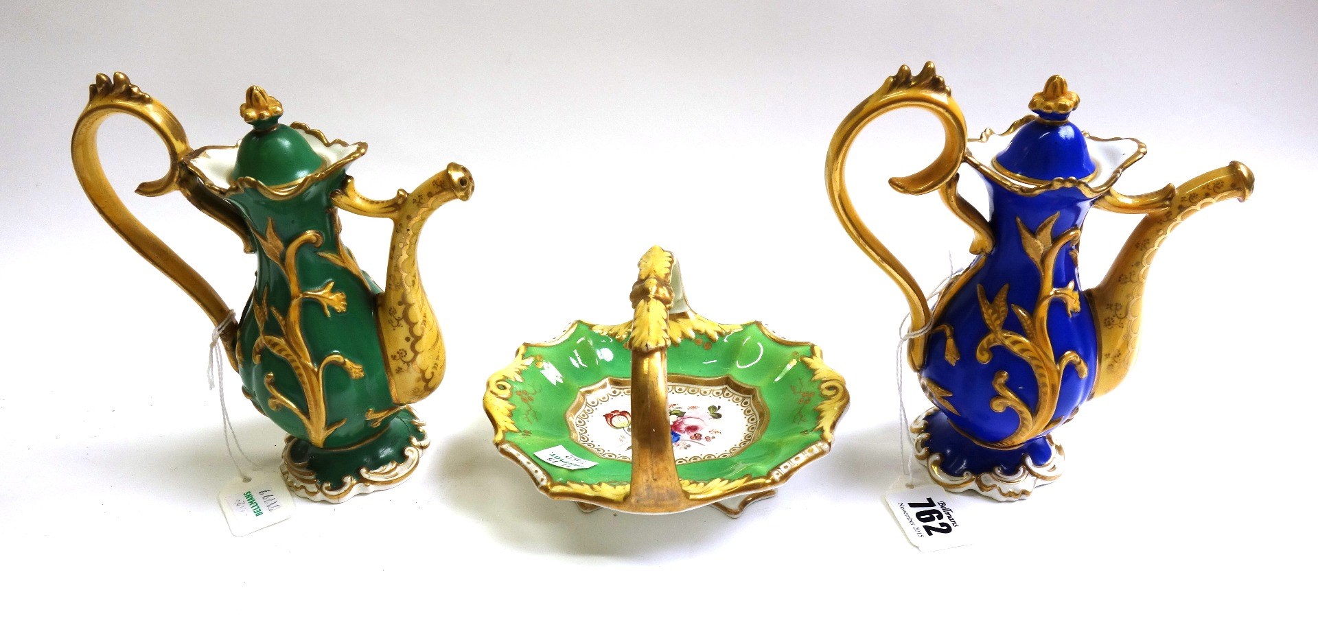 Appraisal: Two English porcelain sprinklers and covers circa of slender pear