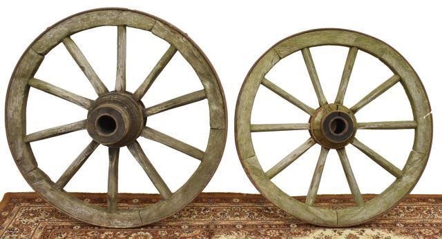 Appraisal: lot of Spoked pine wagon wheels each with patinated metal