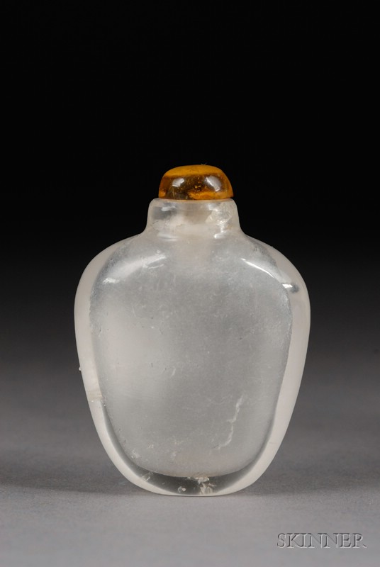 Appraisal: Rock Crystal Snuff Bottle th century well-hollowed surface carved with