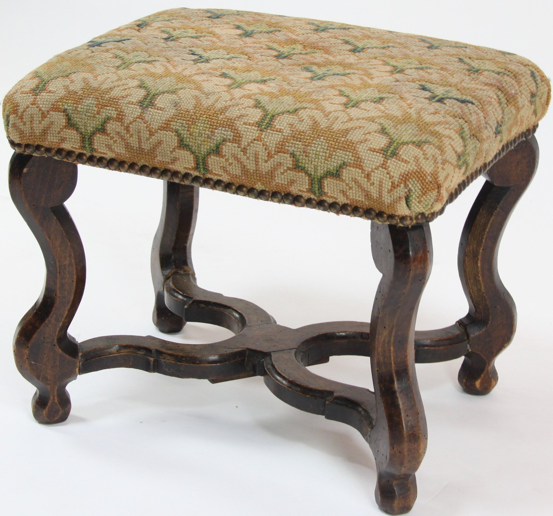 Appraisal: A rectangular fruitwood stool with upholstered top on S-shaped legs