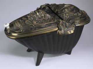 Appraisal: French cast iron bronze coal scuttle th c French Rococo